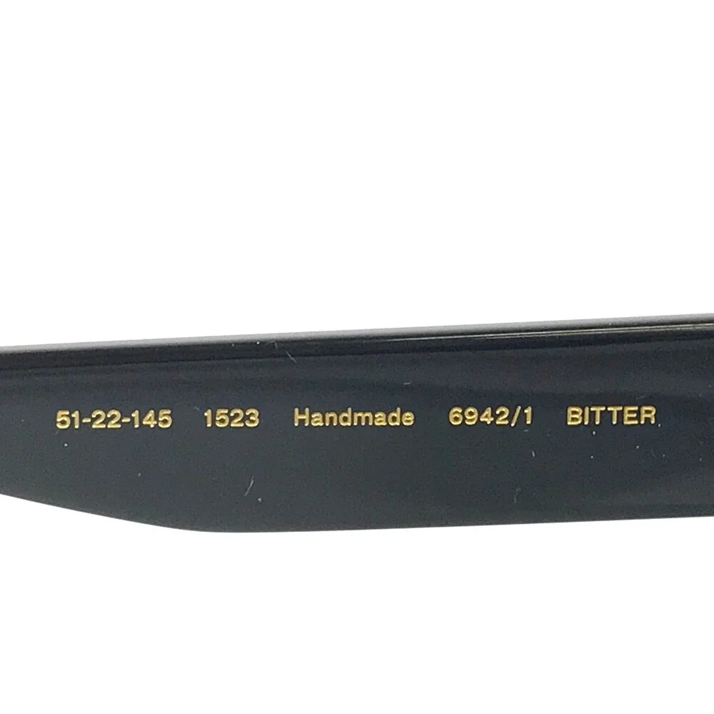Gigi Studios Sunglasses BITTER 6942/1 Shiny Black Frames Gray Gradient Lenses